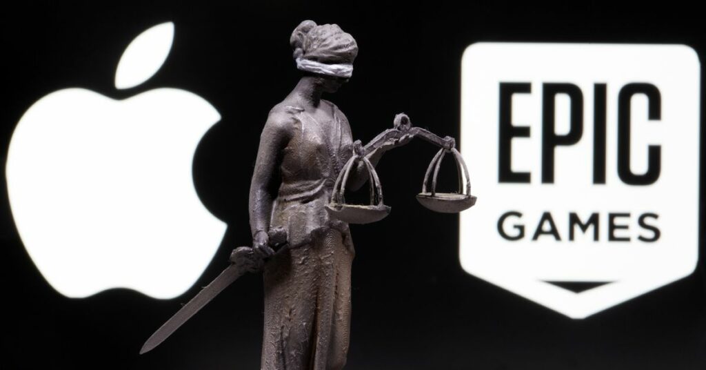 Apple logo is seen on the Apple store at The Marche Saint Germain in Paris, France July 15, 2020.  REUTERS/Gonzalo Fuentes