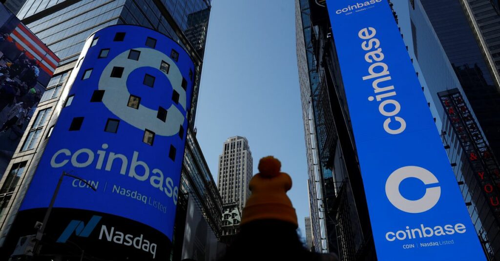 The logo for Coinbase Global Inc, the biggest U.S. cryptocurrency exchange, is displayed on the Nasdaq MarketSite jumbotron and others at Times Square in New York, U.S., April 14, 2021. REUTERS/Shannon Stapleton