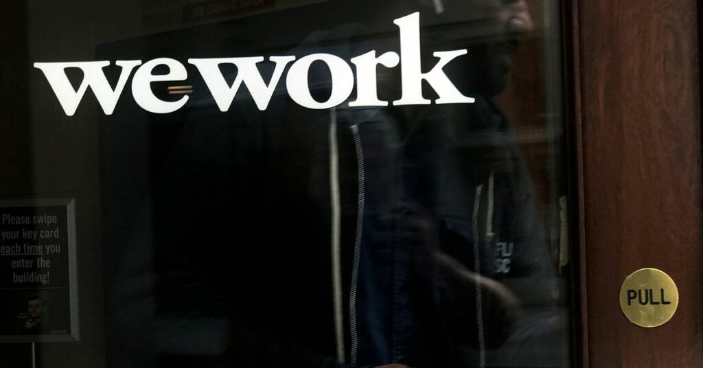 A man walks out of a WeWork space in the Manhattan borough of New York City, New York, U.S., October 4, 2019. REUTERS/Carlo Allegri