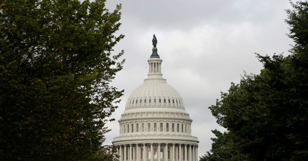 U.S. Senate Republican Leader Mitch McConnell (R-KY) walks through the U.S. Capitol after it was announced that the U.S. Senate reached a deal to pass a $480 billion increase in Treasury Department borrowing authority, averting a debt default in Washington, October 7, 2021. REUTERS/Leah Millis