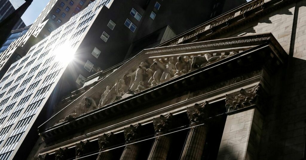 The front facade of the New York Stock Exchange (NYSE) is seen in New York, U.S., February 16, 2021. REUTERS/Brendan McDermid/File Photo