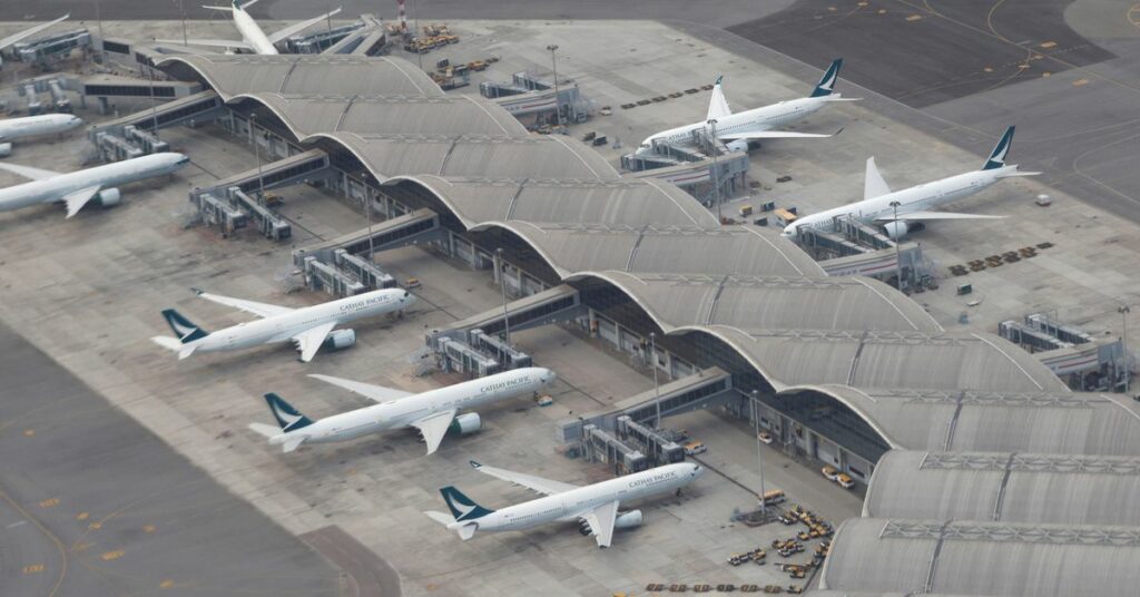 Cathay Pacific planes are parked on the tarmac at Hong Kong International Airport, Hong Kong, China October 24 2020. REUTERS/Tyrone Siu/File Photo