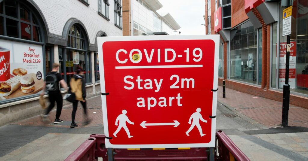 A social distancing sign is seen amid the spread of the coronavirus disease (COVID-19), in Leicester, Britain, May 27, 2021. REUTERS/Andrew Boyers