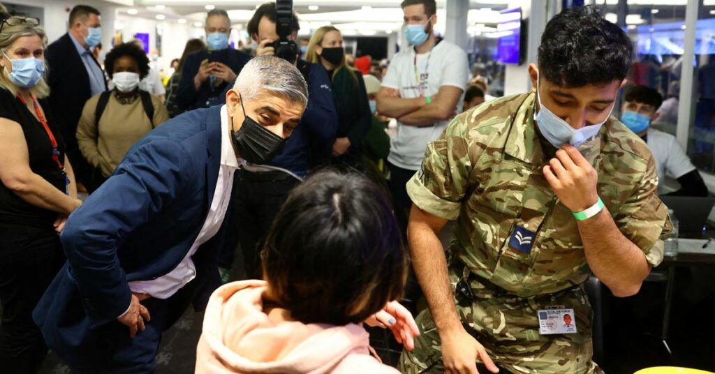 Mayor of London, Sadiq Khan visits a coronavirus disease (COVID-19) pop-up vaccination centre at Chelsea football ground, Stamford Bridge in London, Britain, December 18, 2021. REUTERS/David Klein