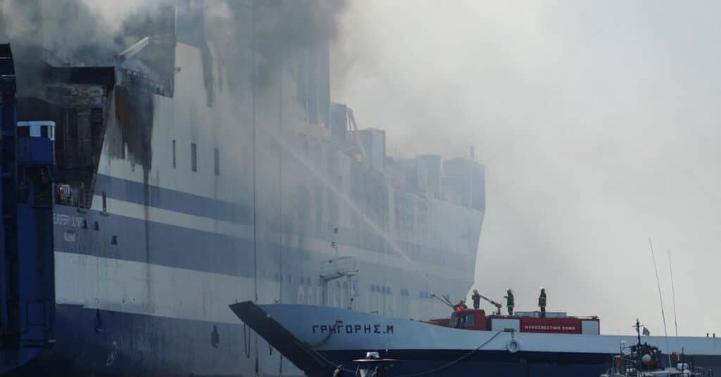 Giorgios Parlatzas from Greece and other survivors of a fire on Italian-flagged Euroferry Olympia watch the news at the Sunrise hotel in Corfu, Greece, February 18, 2022. REUTERS/Guglielmo Mangiapane