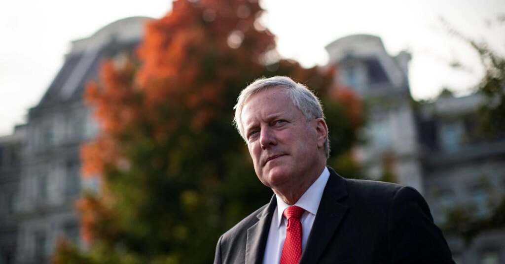 White House Chief of Staff Mark Meadows walks past reporters after speaking with Fox News