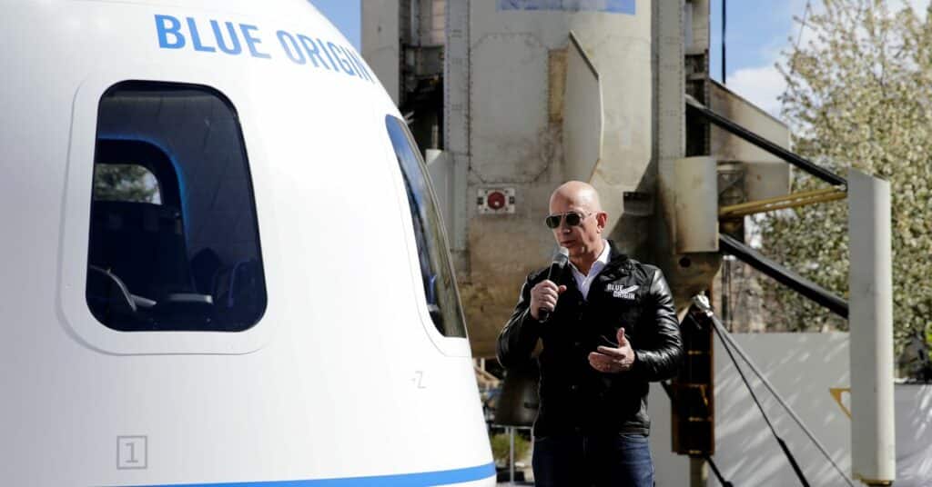 Amazon and Blue Origin founder Jeff Bezos addresses the media about the New Shepard rocket booster and Crew Capsule mockup at the 33rd Space Symposium in Colorado Springs