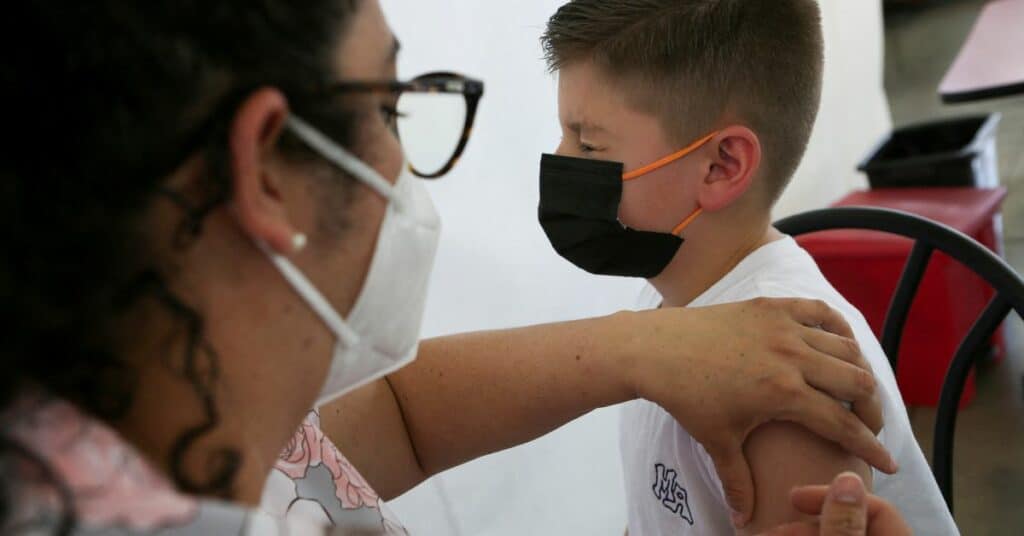 Children age 5 and up receive vaccinations against the coronavirus disease (COVID-19), in San Jose