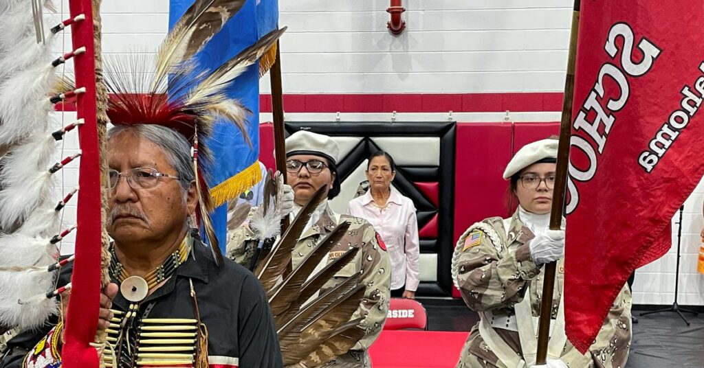 U.S. Assistant Interior Department Secretary for Indian Affairs, Bryan Newland and Interior Department Secretary Deb Haaland stand at the beginning of an event in Anadarko, Oklahoma