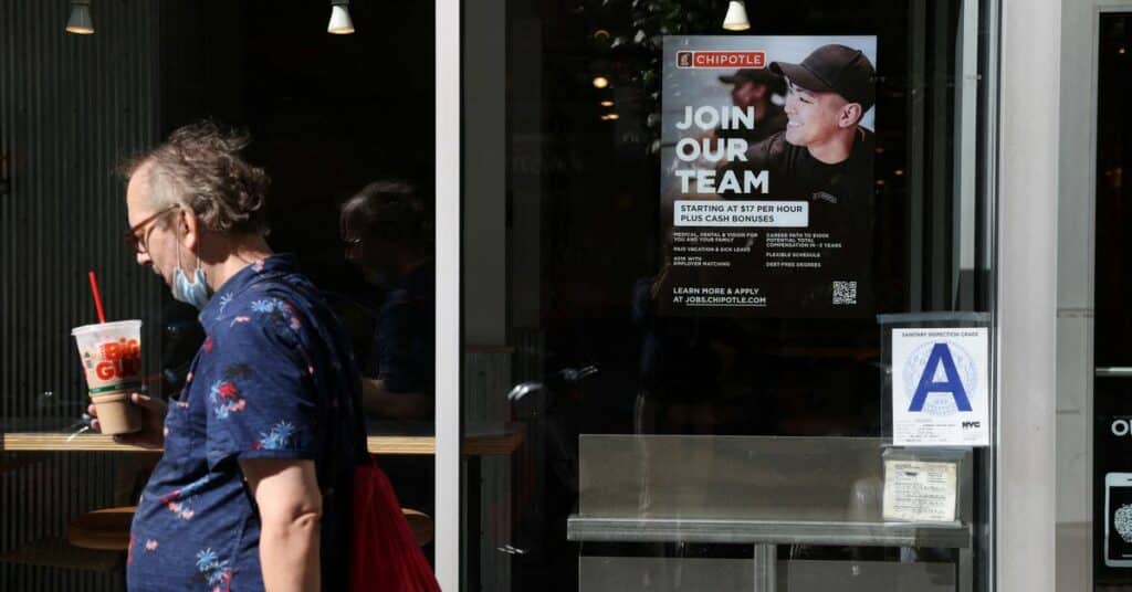 A hiring sign is seen in a restaurant as the U.S. Labor Department released its July employment report, in Manhattan, New York City