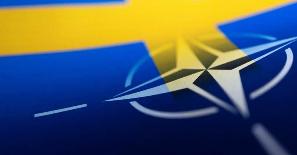 Illustration shows Swedish and NATO flags