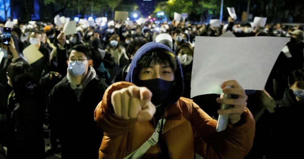 Vigil commemorating victims of a fire in Urumqi, in Beijing