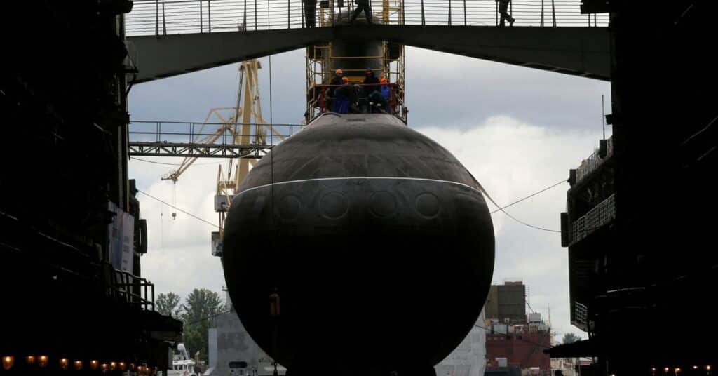 People attend a ceremony launching the diesel-electric submarine