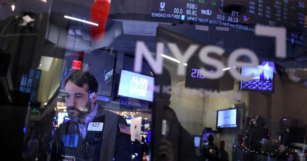 A trader works on the trading floor at the New York Stock Exchange (NYSE) in New York City