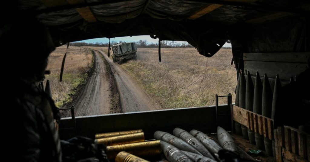 Ukrainian serviceman rides inside a truck with artillery shells near a frontline in Zaporizhzhia region