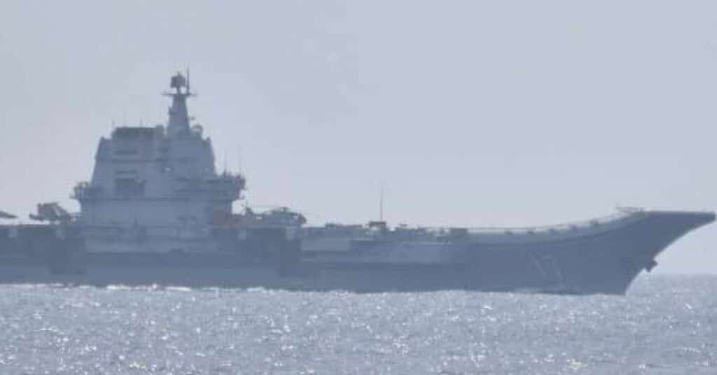 A jet fighter takes off from China's Shandong aircraft carrier, south of Okinawa prefecture