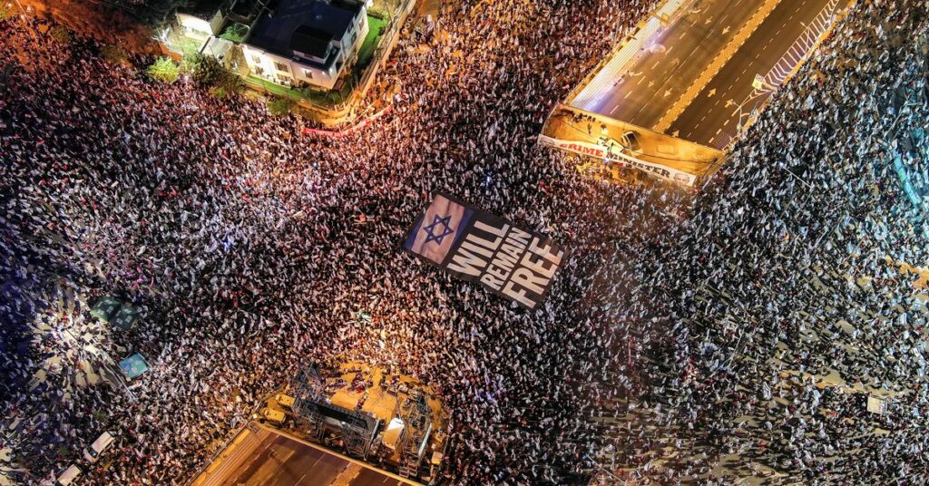 People demonstrate against Israeli Prime Minister Benjamin Netanyahu and his nationalist coalition government's judicial overhaul, in Tel Aviv