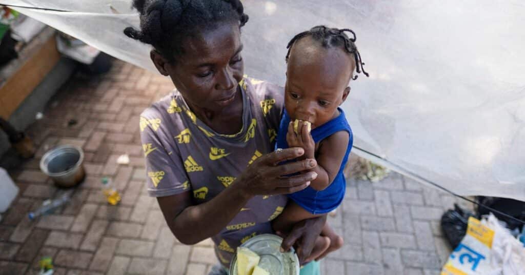 People displaced by gang war violence in Cite Soleil take refuge at the Hugo Chavez Square in Port-au-Prince.