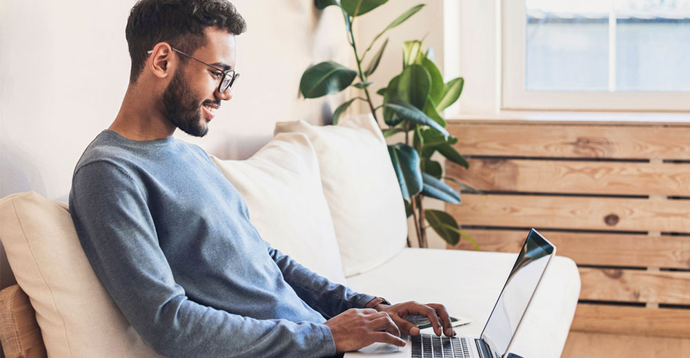 man using a laptop to shop online